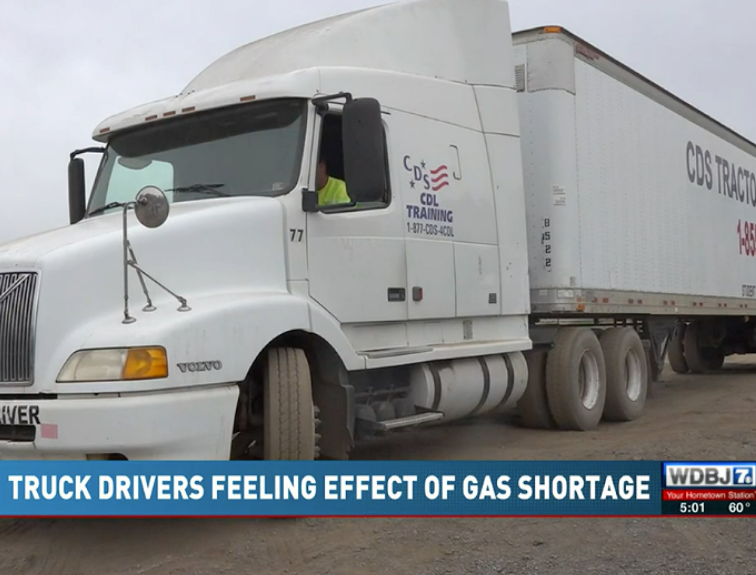 image of CDS truck with student driver, a text banner at the bottom reads "truck drivers feeling effect of gas shortage" and WDBJ7 news logo
